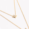 Collar doble de acero con estrellas.